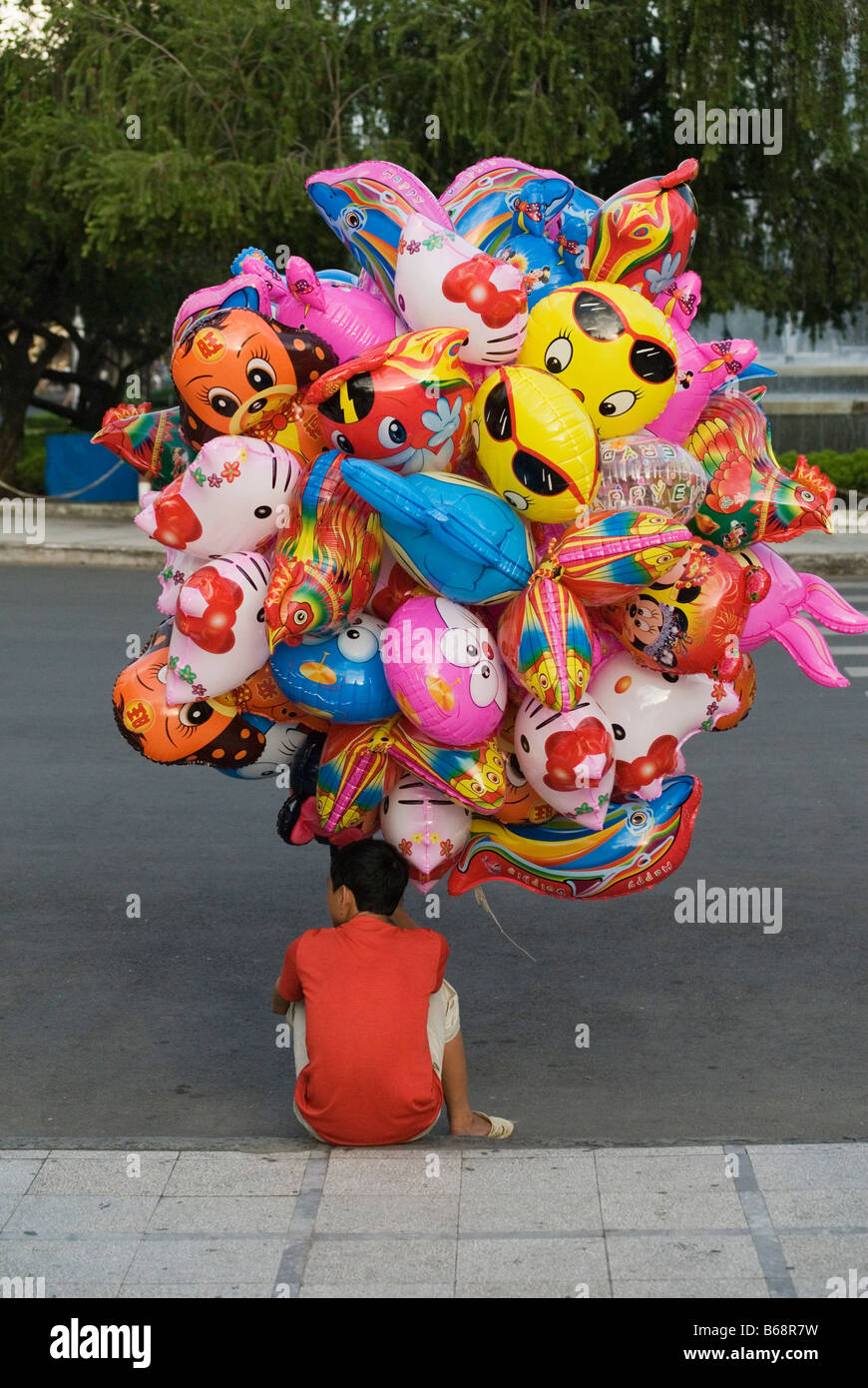 Balloon hawker in Ho Chi Minh City, Vietnam Stock Photo
