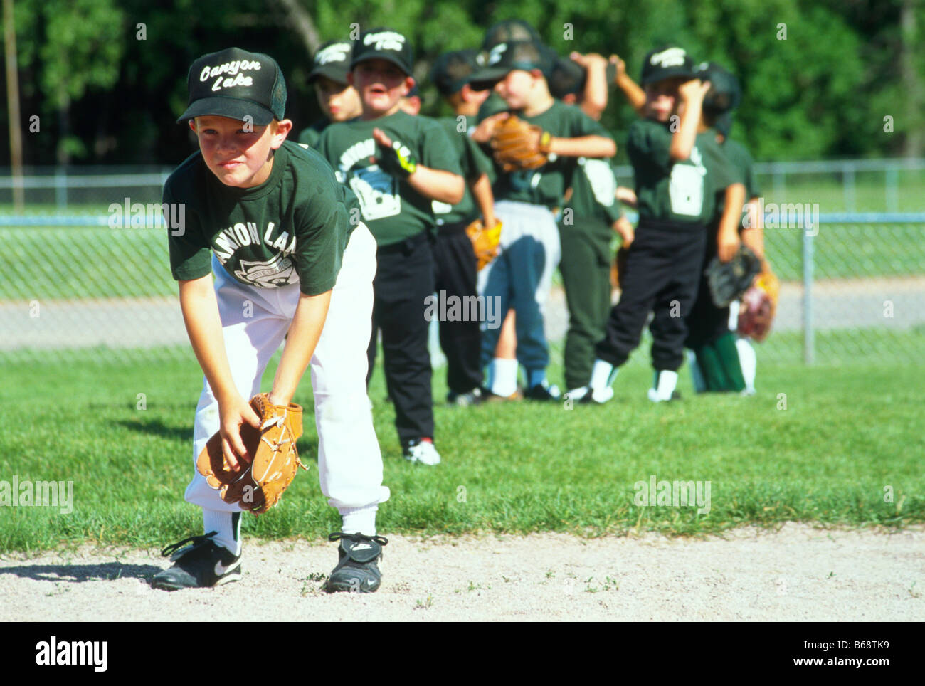 Little league baseball team queue hires stock photography and images