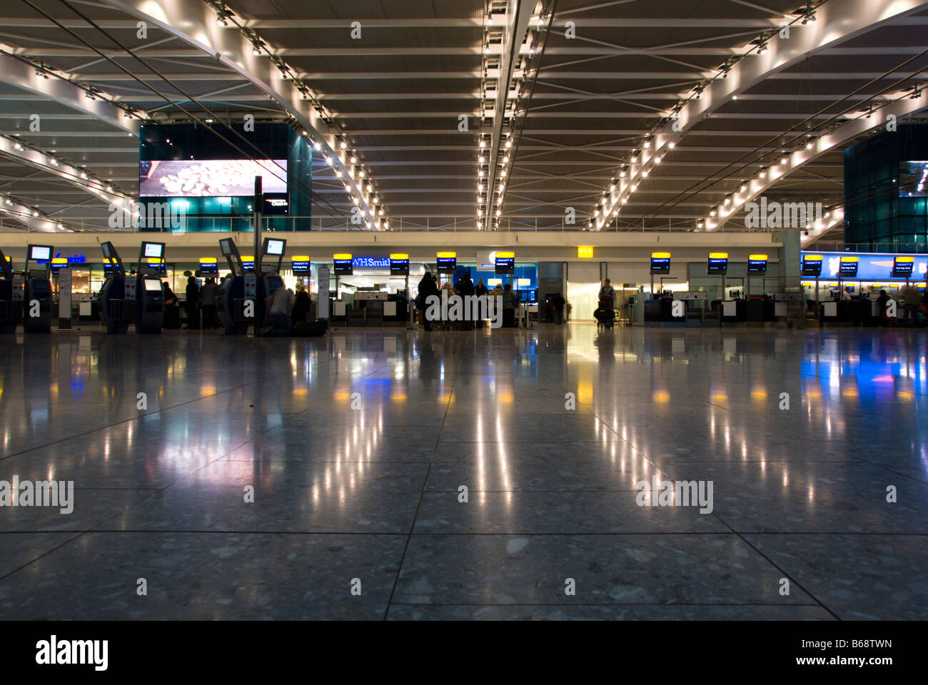 Checkin desks at Heathrow Airport Stock Photo Alamy