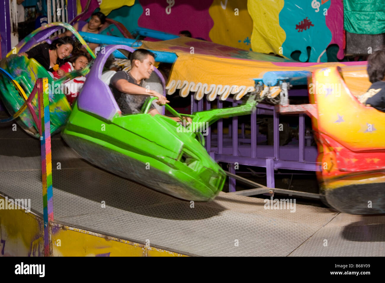 Oaxaca, Mexico. Day of the Dead.  Amusement Ride outside entrance to San Miguel Cemetery. Stock Photo