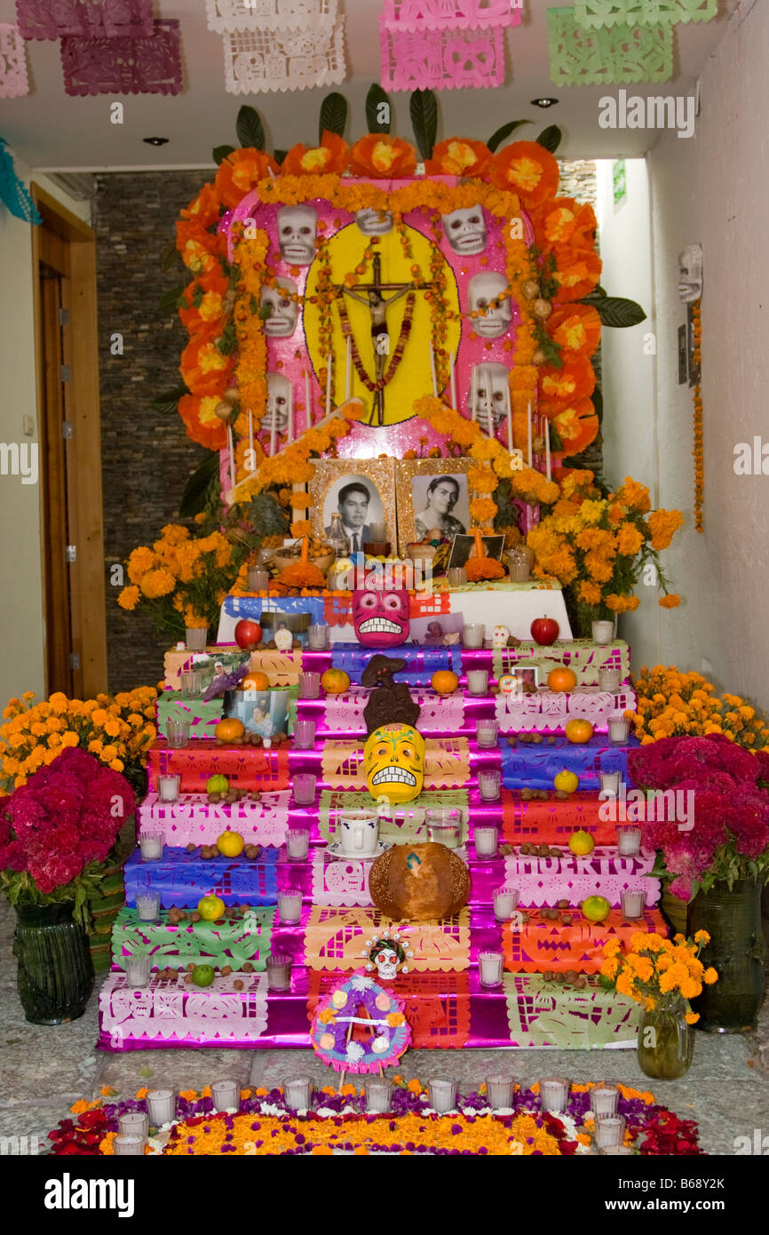 Oaxaca, Mexico. Day of the Dead.  Family Altar in the Courtyard of a Small Boutique Hotel,  La Casa de las Bugambillas. Stock Photo