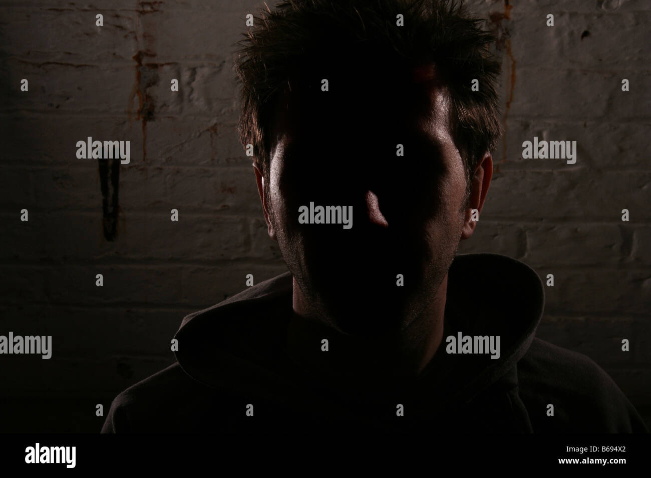 A silhouette of a caucasian male youth Stock Photo - Alamy