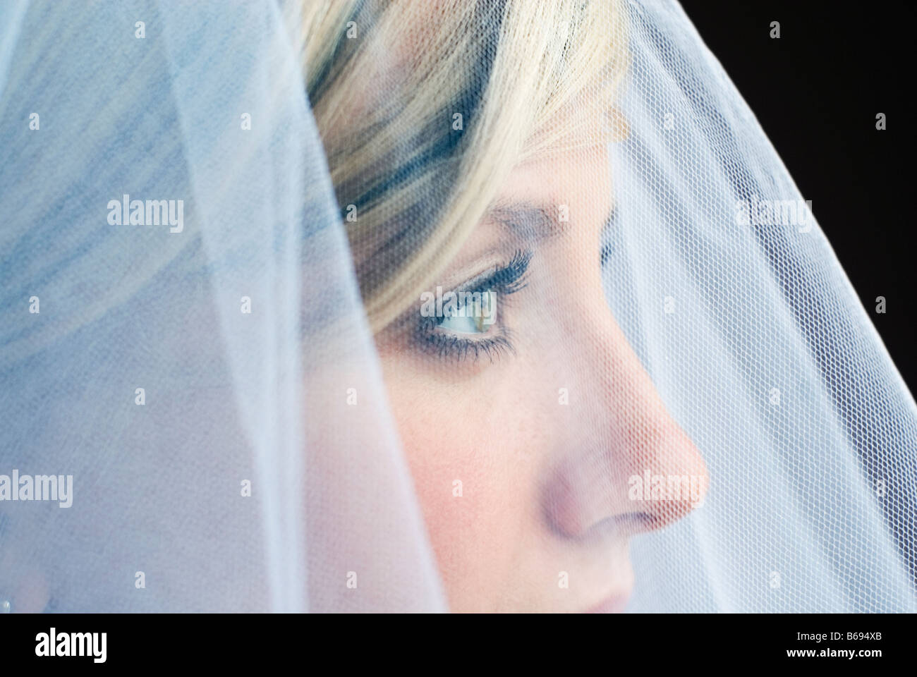 Bride wearing veil, close up Stock Photo Alamy