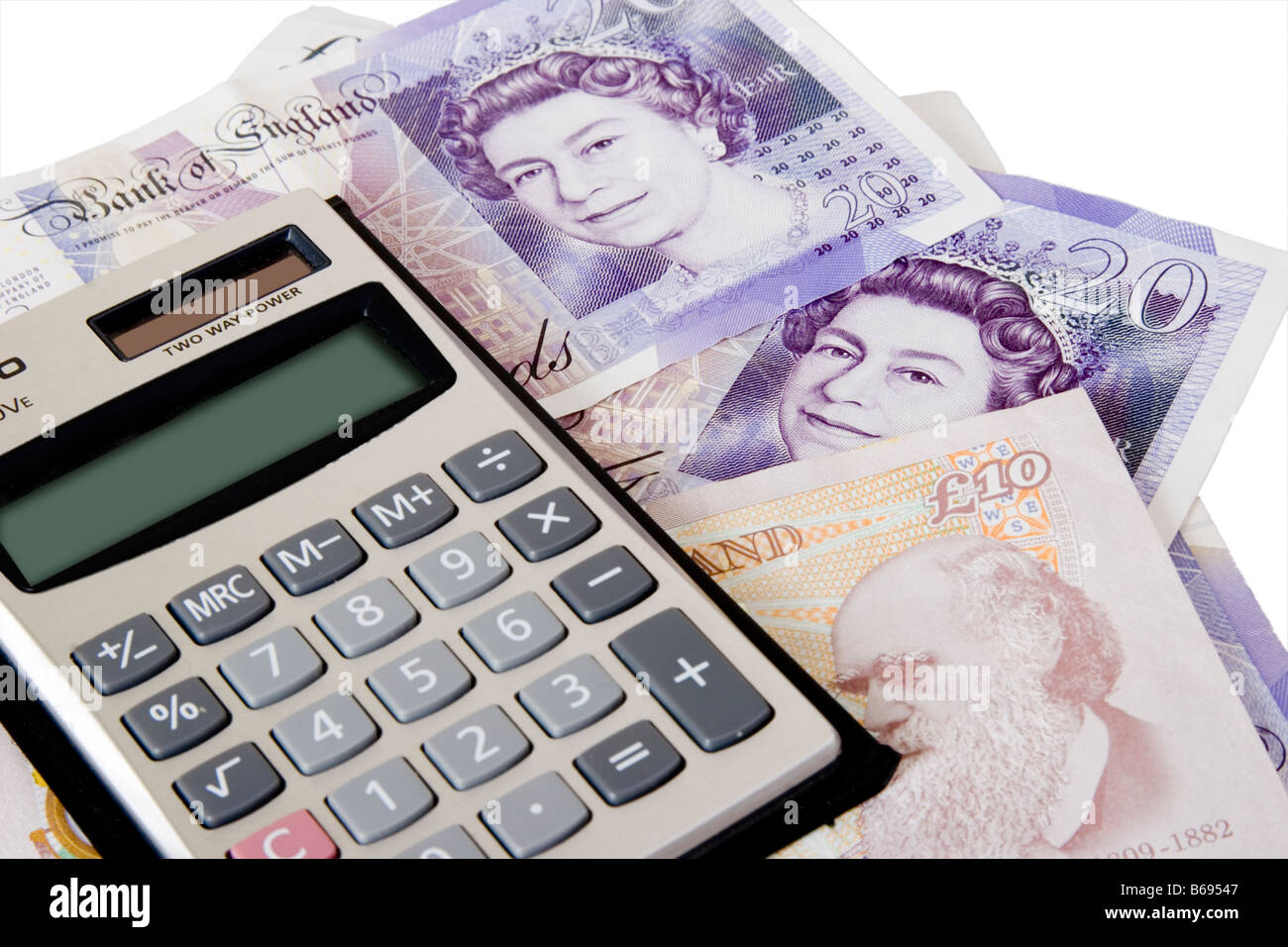 Calculator and English bank notes Stock Photo - Alamy