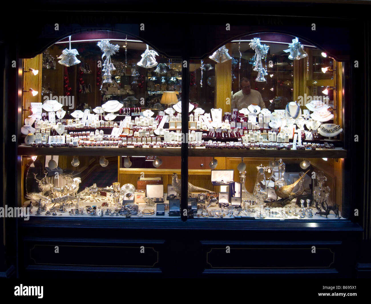 A jewellers shop window with expensive second had jewellery on sale Stock Photo