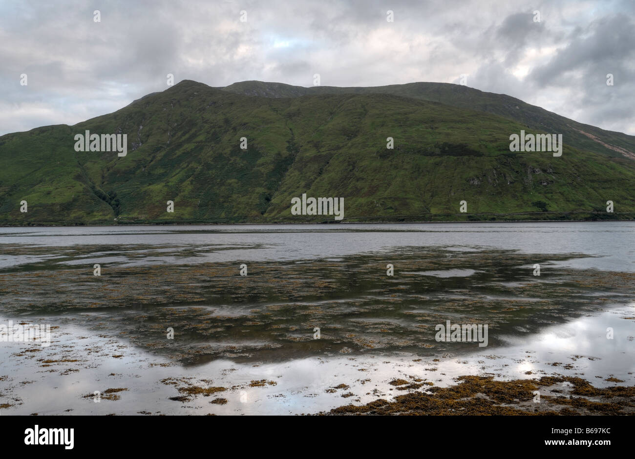 Mweelrea Mountain over Killary Harbour fjord reflection low tide border bordering counties Mayo