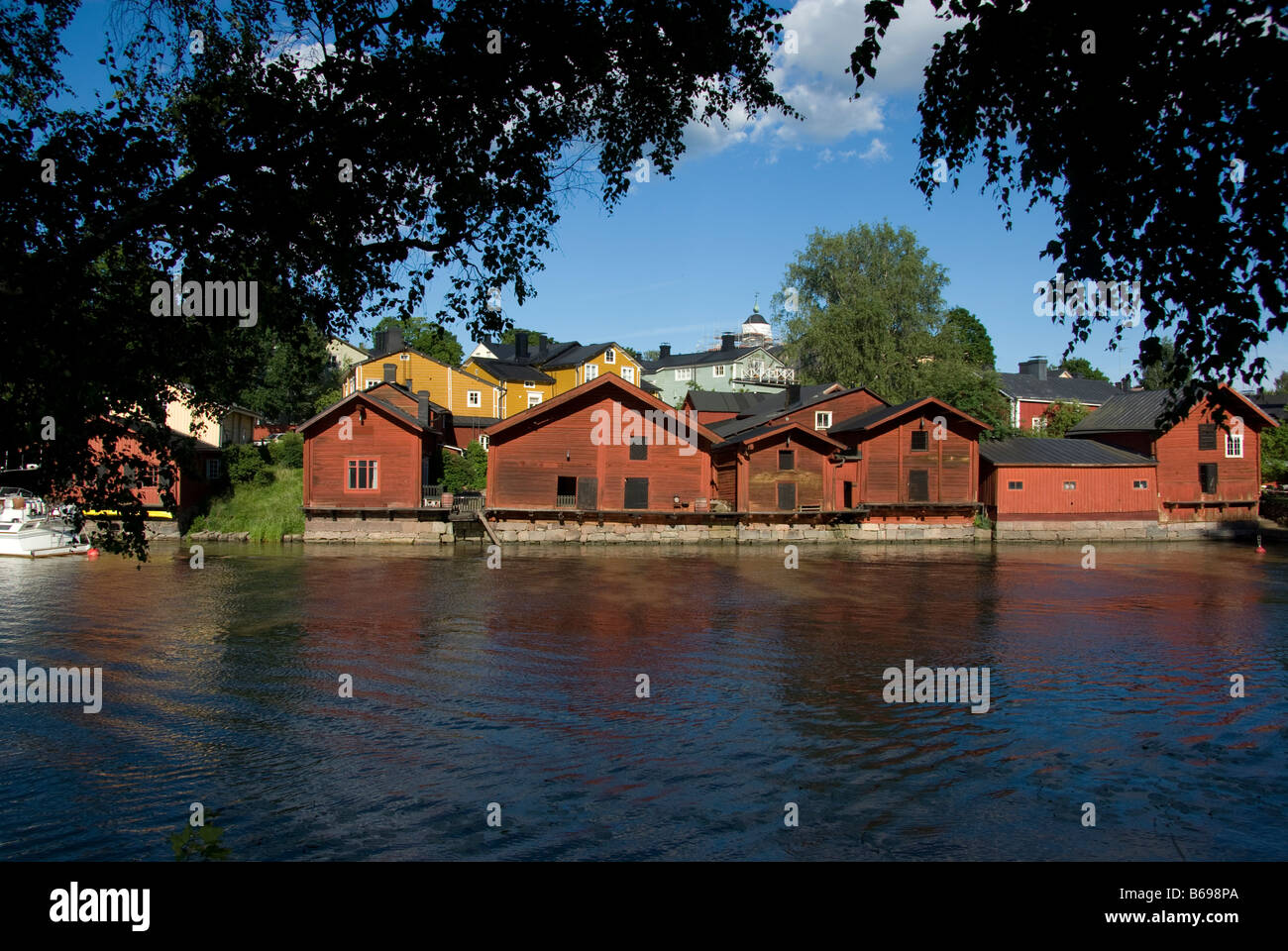 Old riverside storehouses on the waterfront of Porvoo river Stock Photo