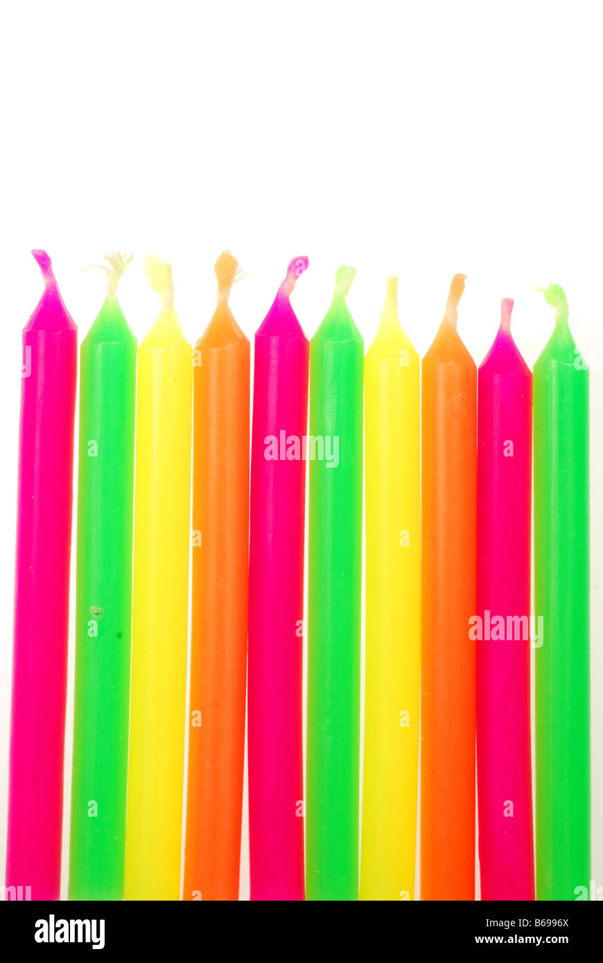 Row of unlit birthday candles isolated on white background Stock Photo ...