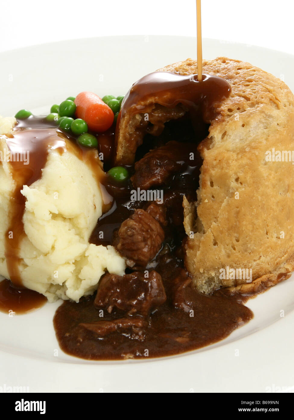 Steak pie with gravy Stock Photo Alamy