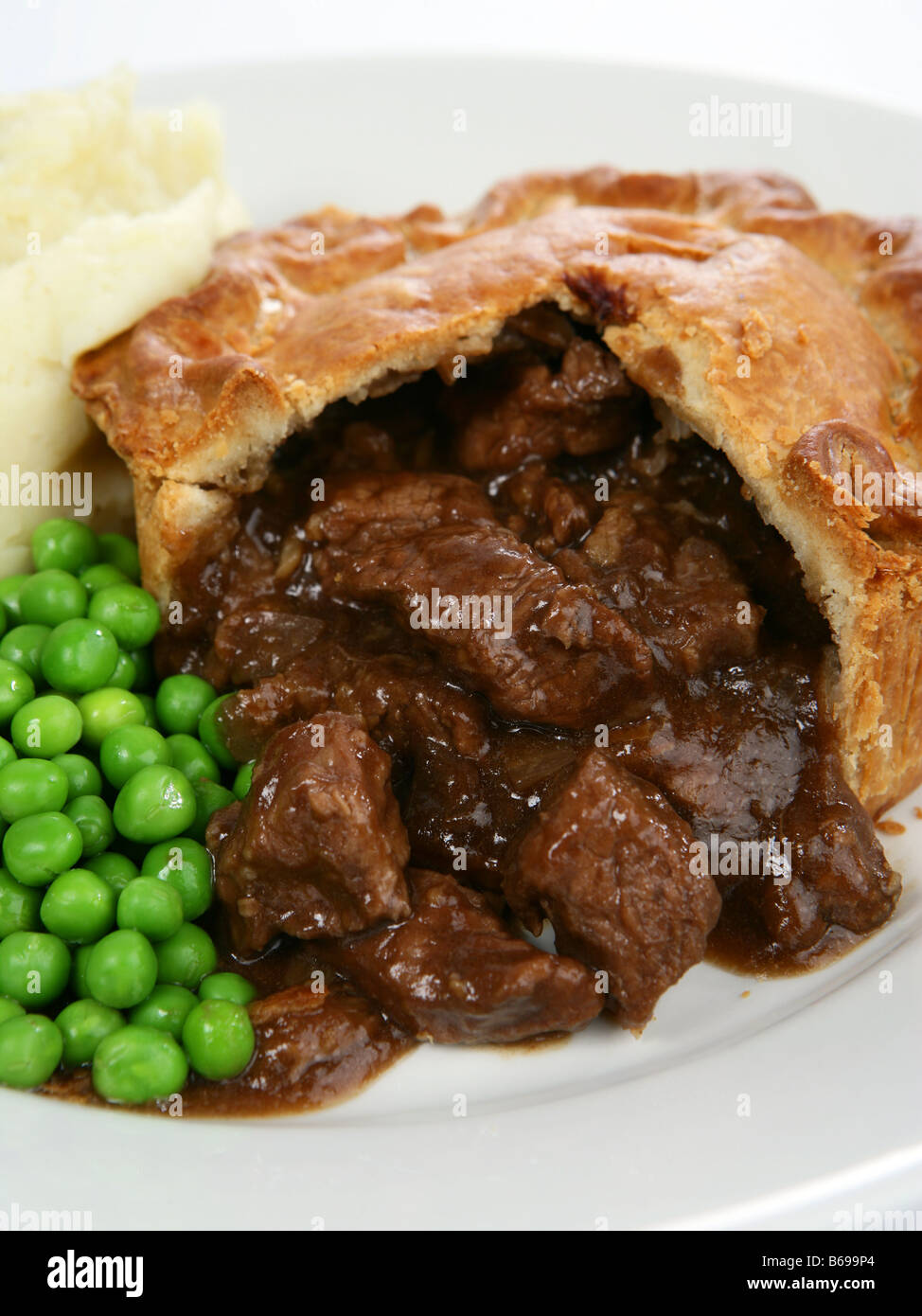 Steak pie with gravy Stock Photo Alamy