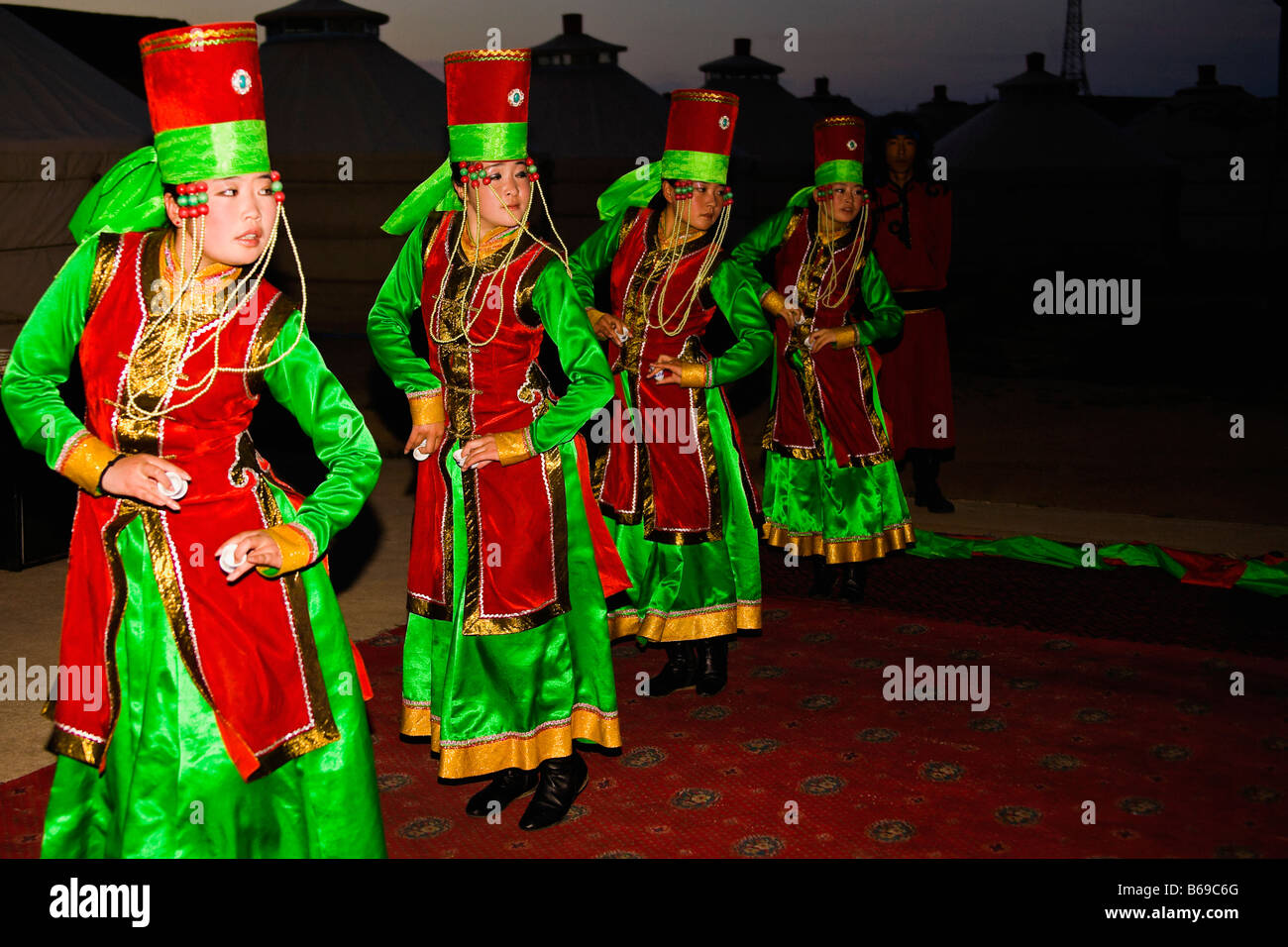 Four young women dancing, Inner Mongolia, China Stock Photo