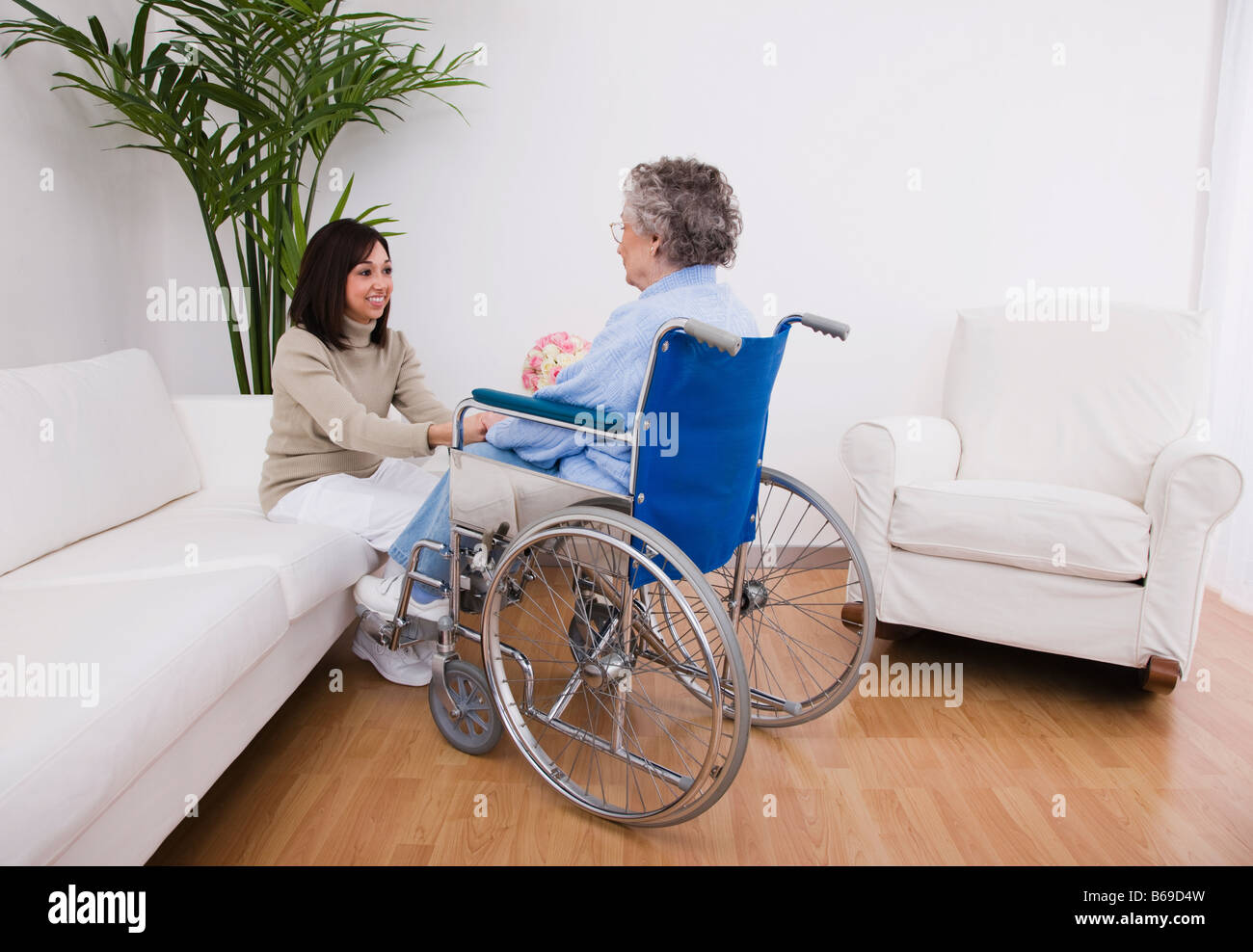 Old woman in wheelchair hi-res stock photography and images - Alamy