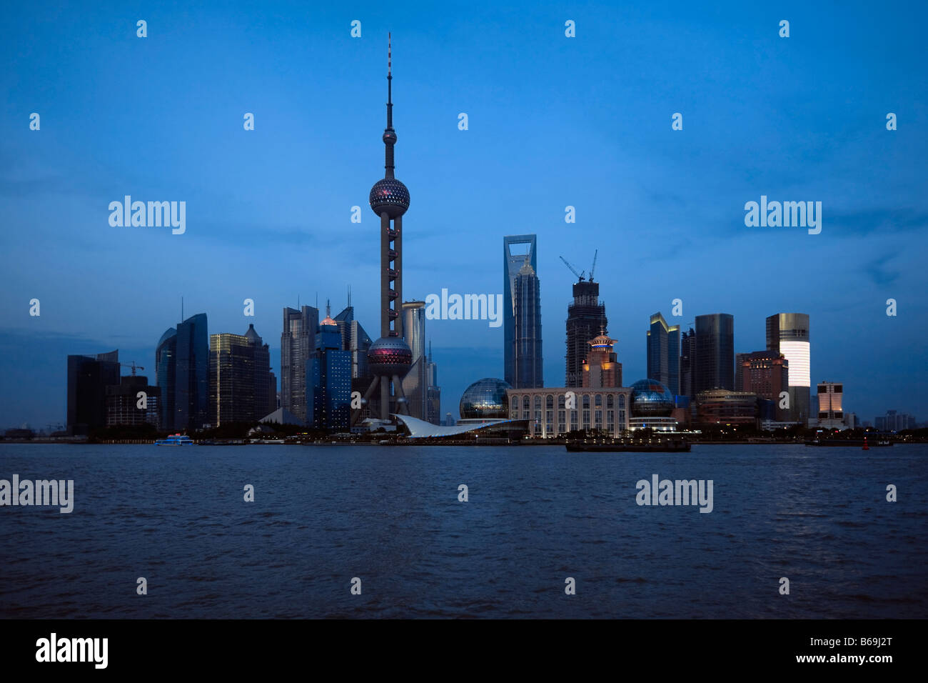 Buildings at the waterfront, Oriental Pearl Tower, Huangpu River ...