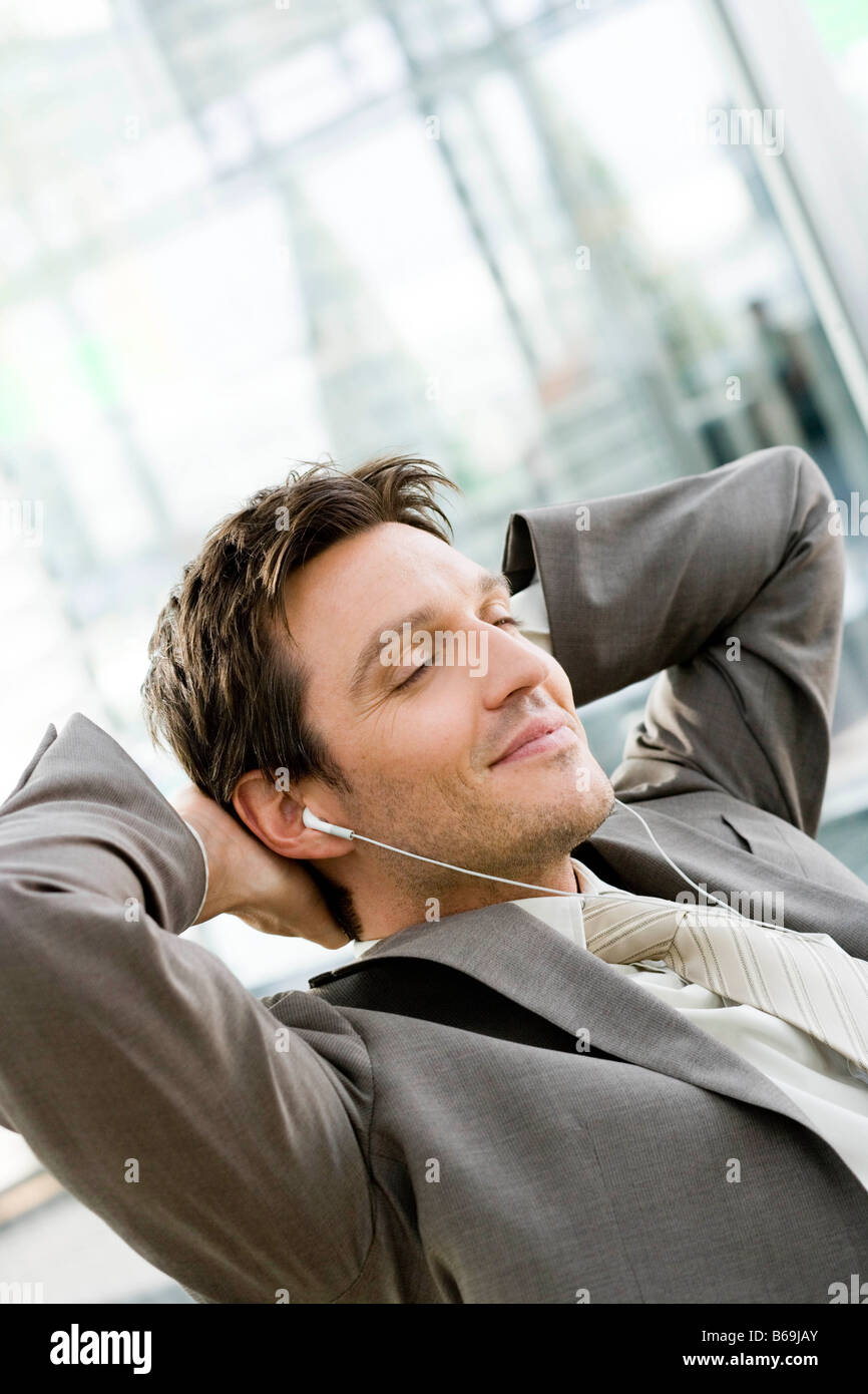 Man listening wearing headphones Stock Photo - Alamy