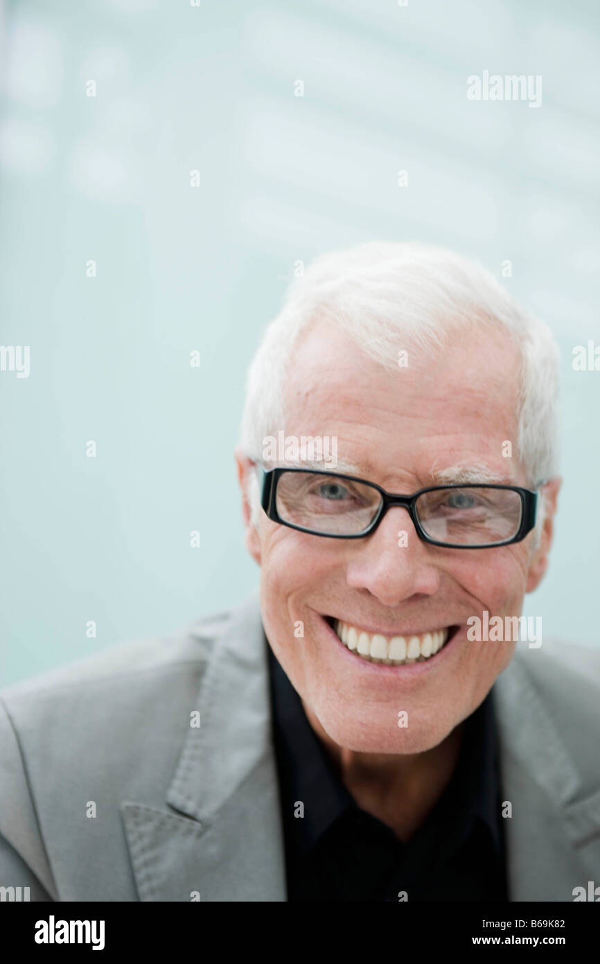 Older man smiling into camera hi-res stock photography and images - Alamy