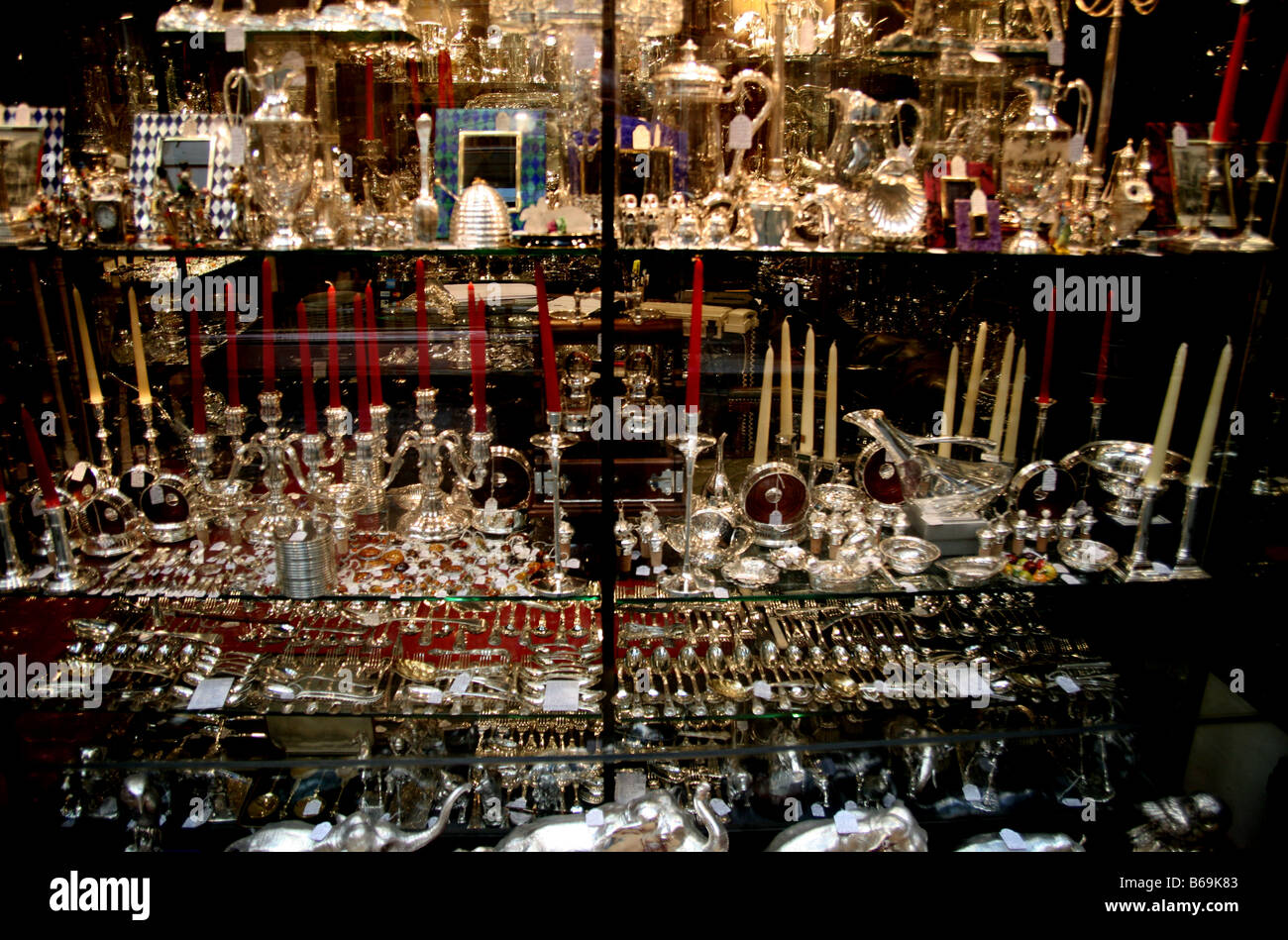Antique silverware on display in London shop Stock Photo Alamy