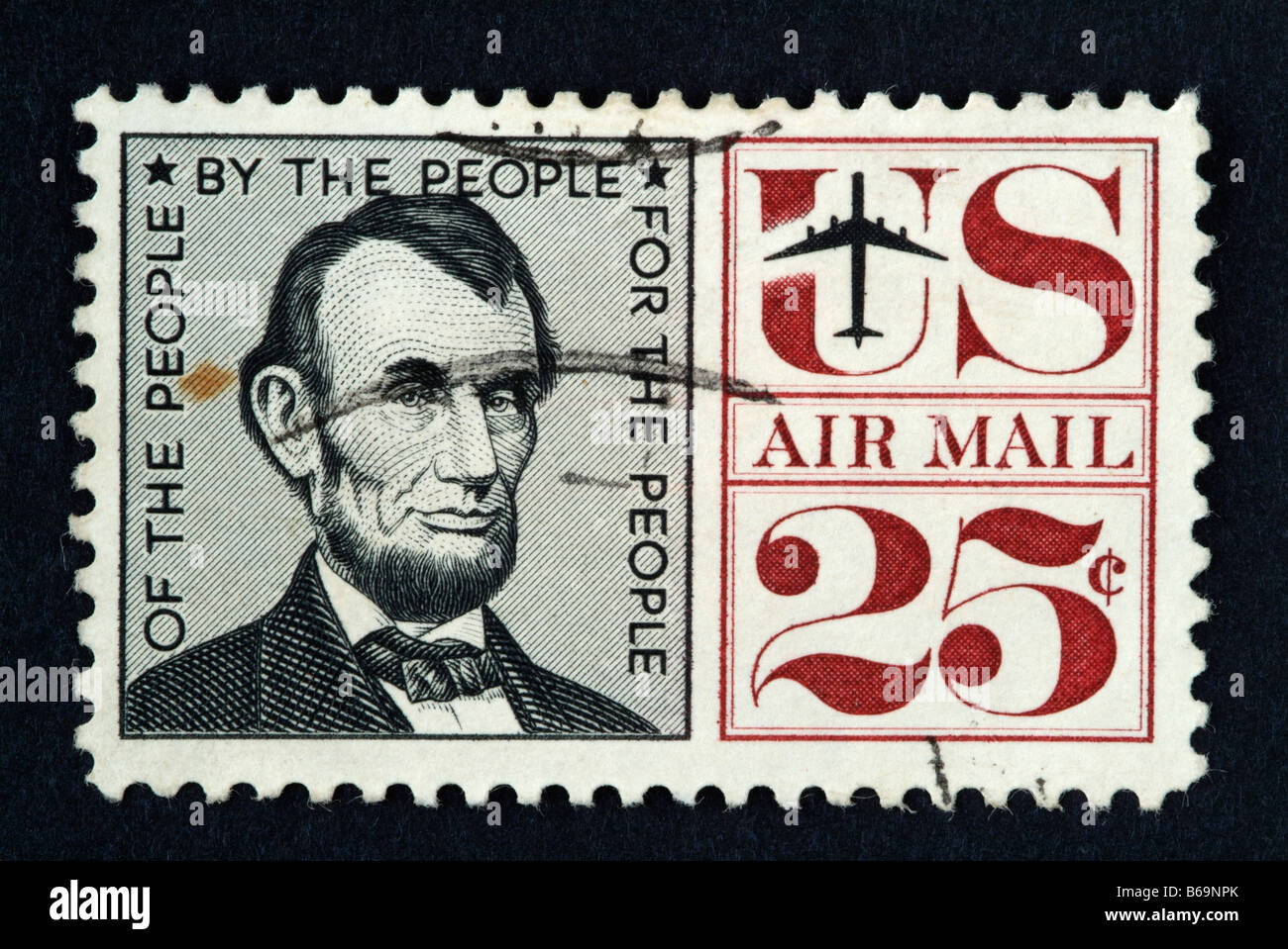 A 25 cent US air mail postage stamp with the image of Abraham Lincoln