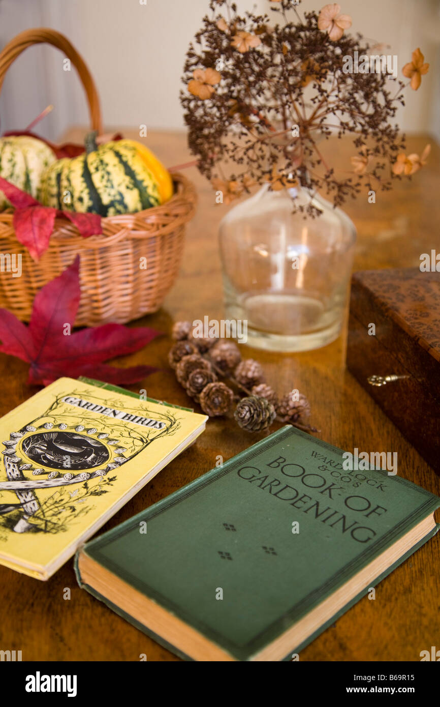 Vintage gardening books on table Stock Photo Alamy
