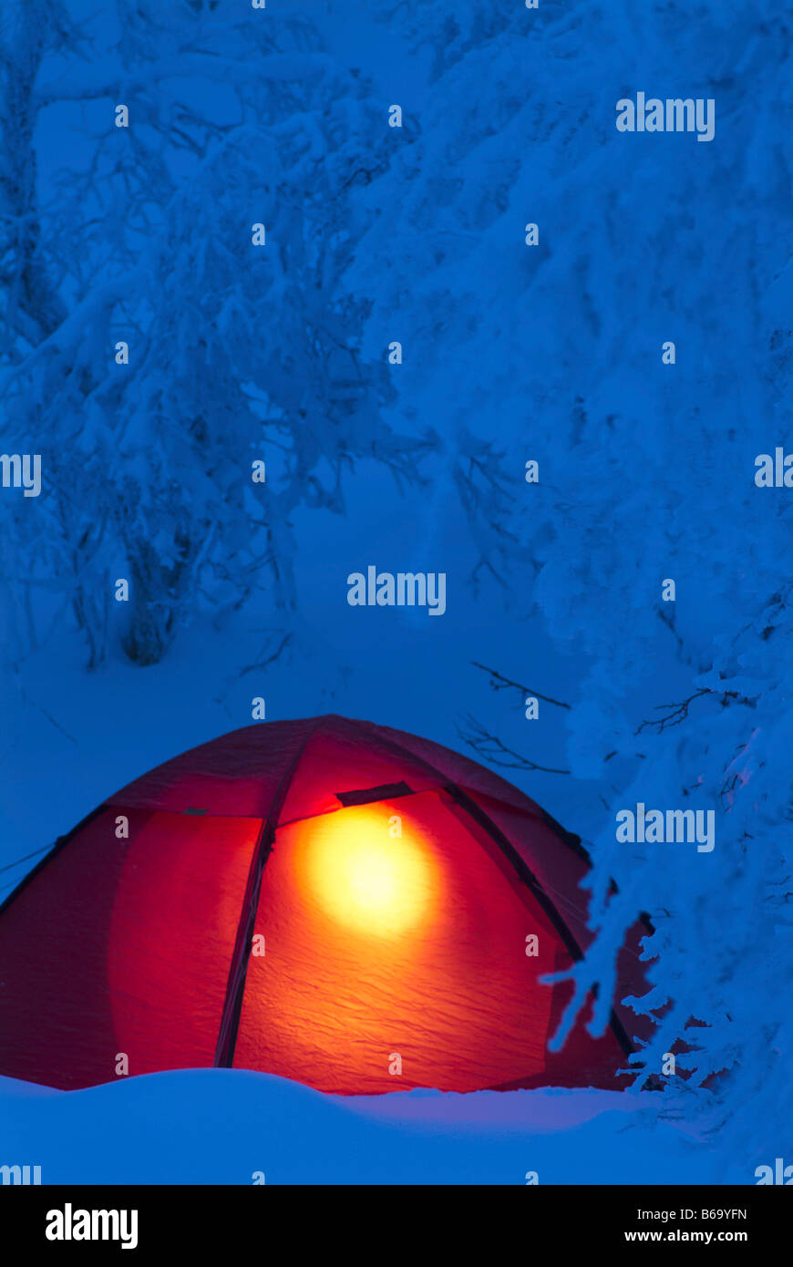 Extreme camping in deep snow, Sweden Stock Photo