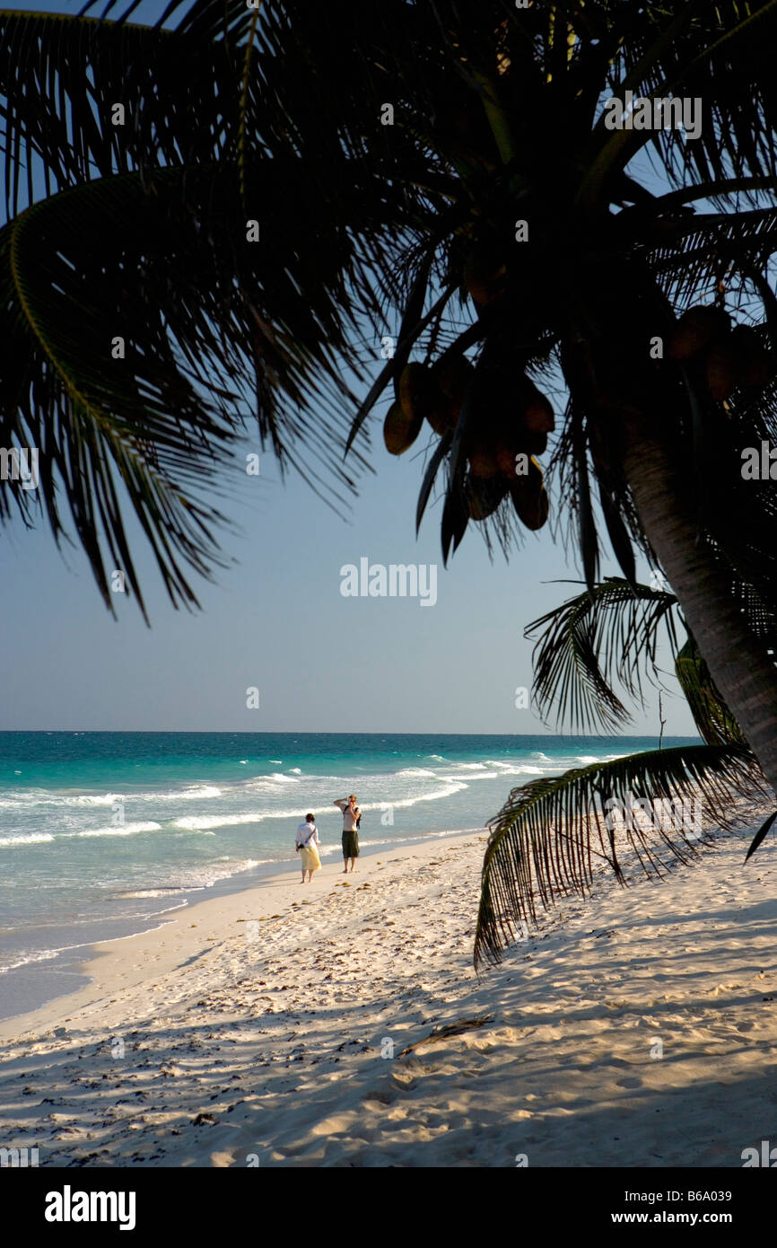 Mexico, Quintana Roo, Tulum, Tourists walking at beach Stock Photo