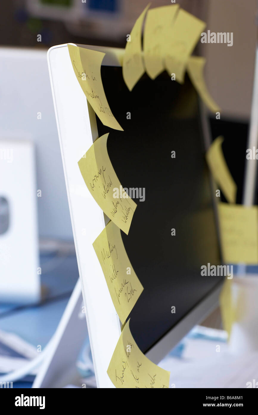Post it notes on computer screen Stock Photo - Alamy