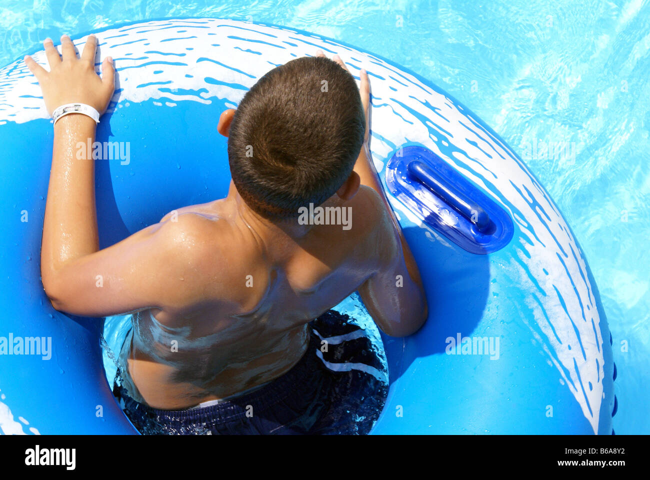 Inside of inner tube in swimming pool Stock Photo Alamy