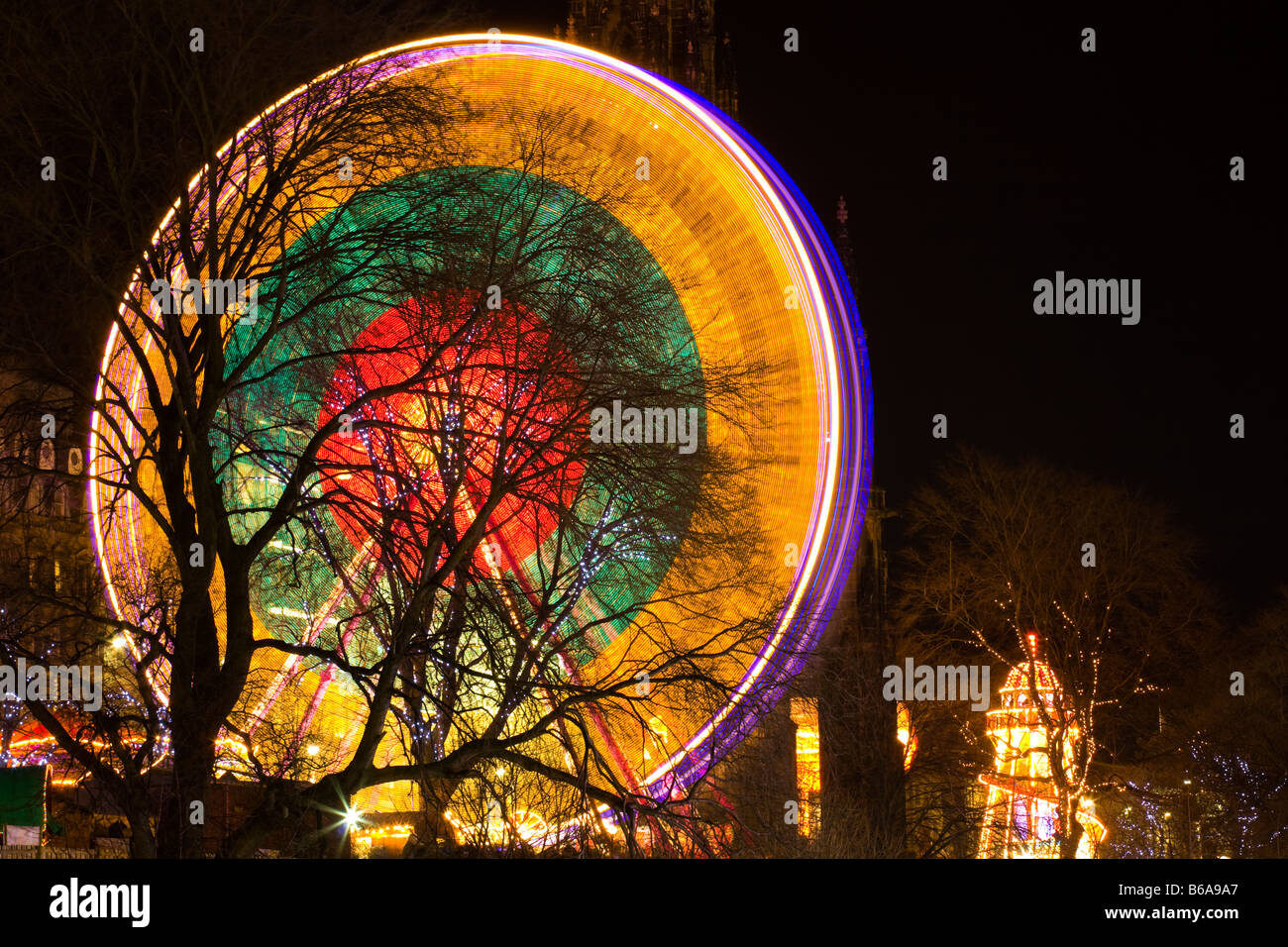 Scotland Edinburgh Christmas Fair Ferris wheel located near the Scott Monument in East Princes