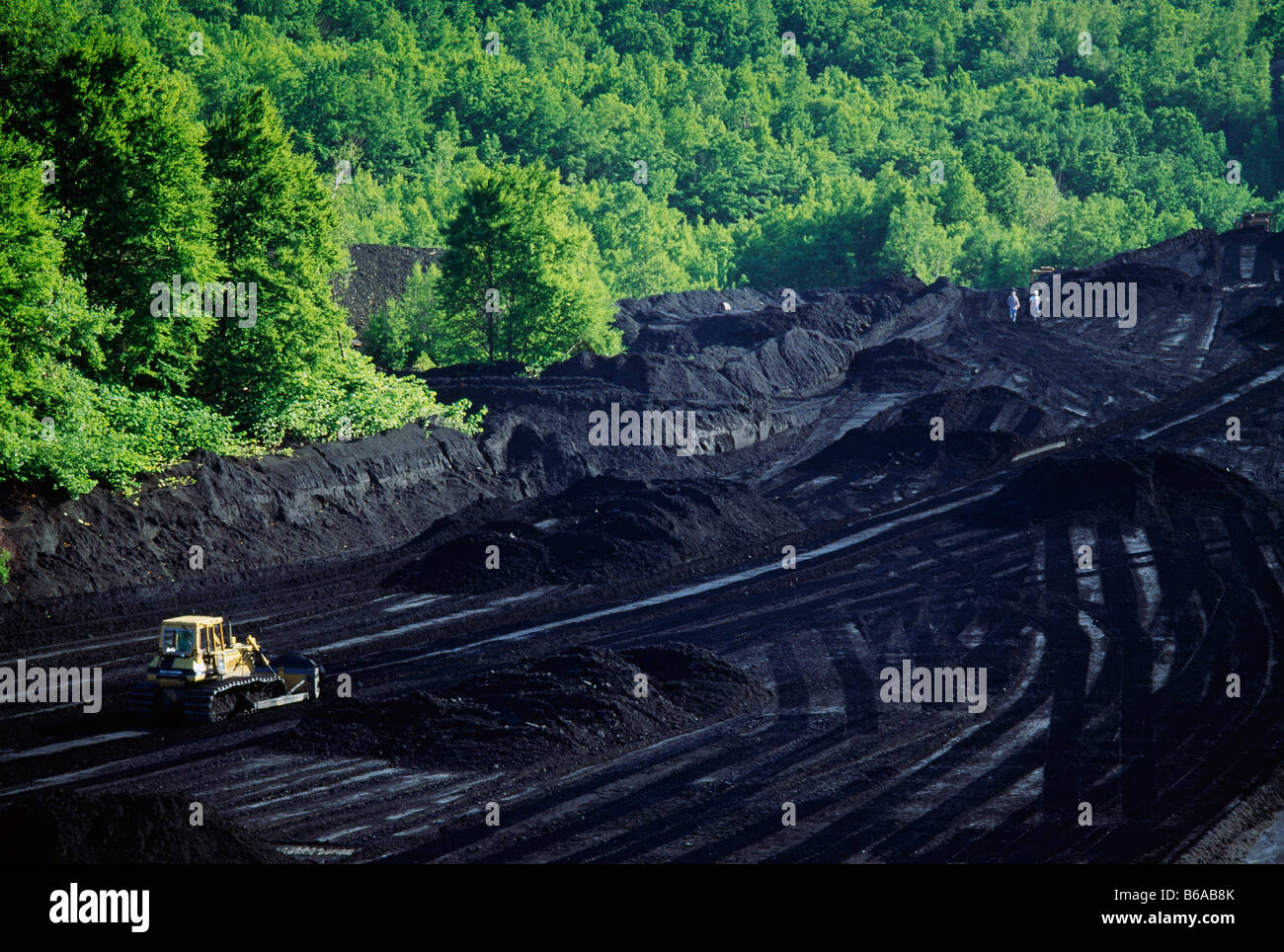 LARGE BULLDOZER MINING A 'DAM' OF ANTHRACITE (HARD) COAL (OPEN PIT OR