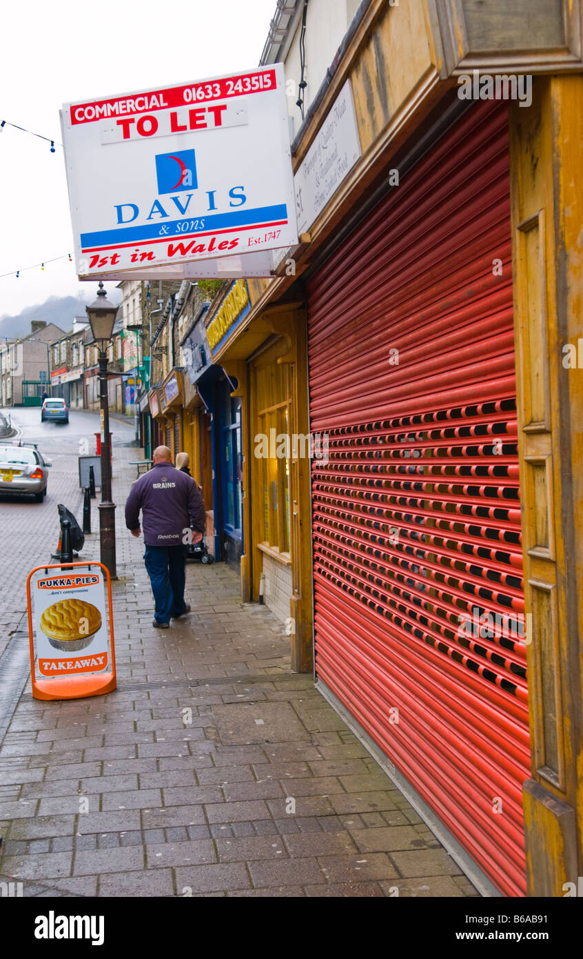 Closed and shuttered former butchers shop TO LET in Abertillery