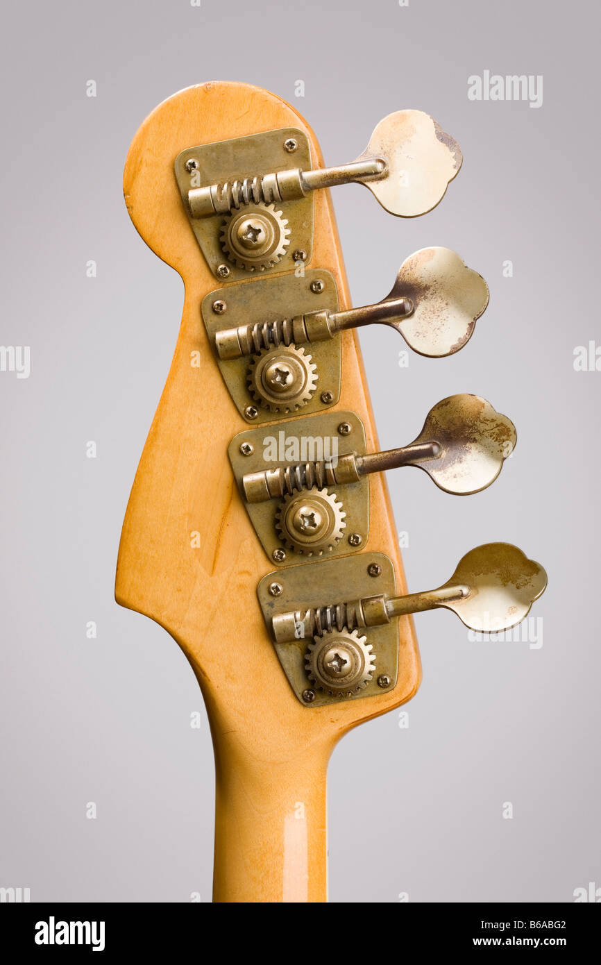 Rear view close up of bass guitar tuning pegs Stock Photo