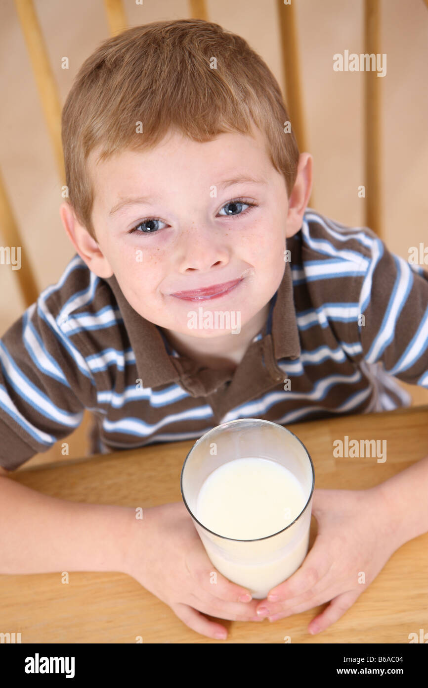 Young boy with glass of milk Stock Photo