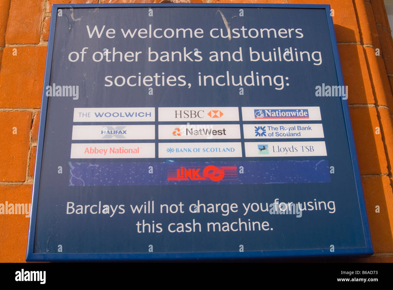 Sign outside Barclays Bank inviting customers of other banks to use their atm cash machine speedbank without charge in uk Stock Photo