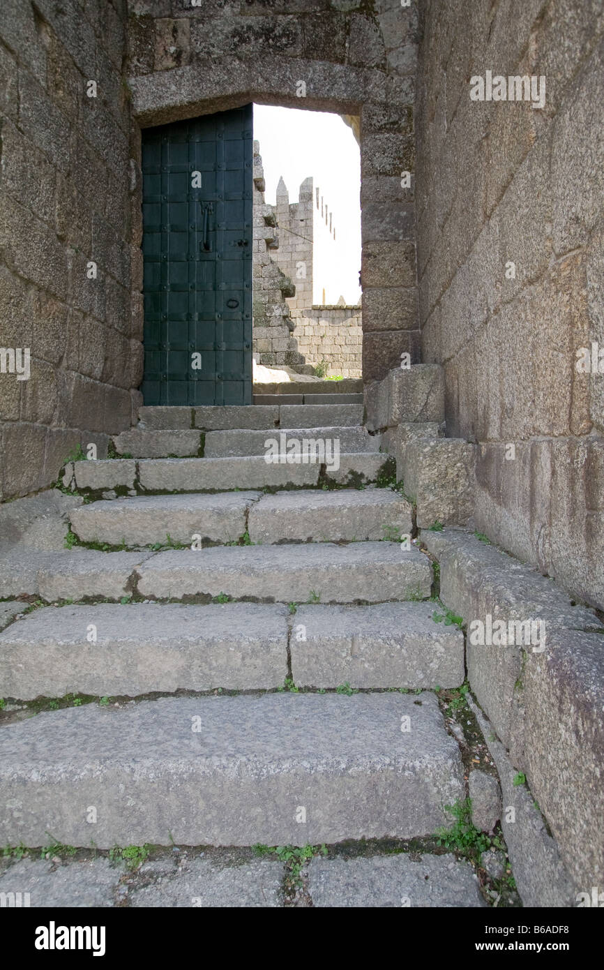 Guimaraes Castle gate in Guimaraes city, Portugal. World Heritage Site by UNESCO. Stock Photo
