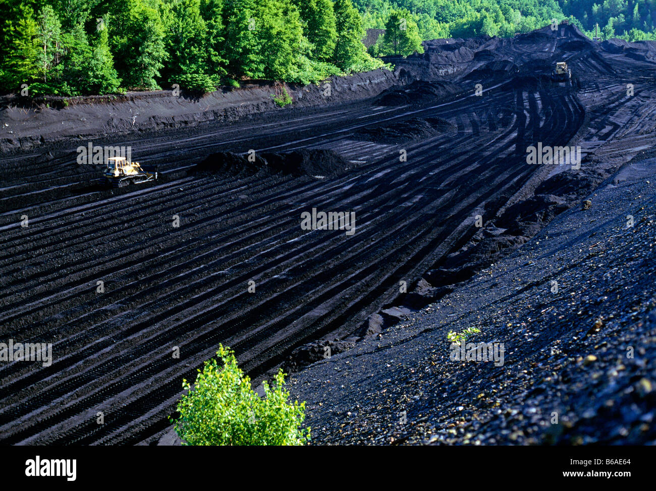 LARGE BULLDOZER MINING A 'DAM' OF ANTHRACITE (HARD) COAL (OPEN PIT OR