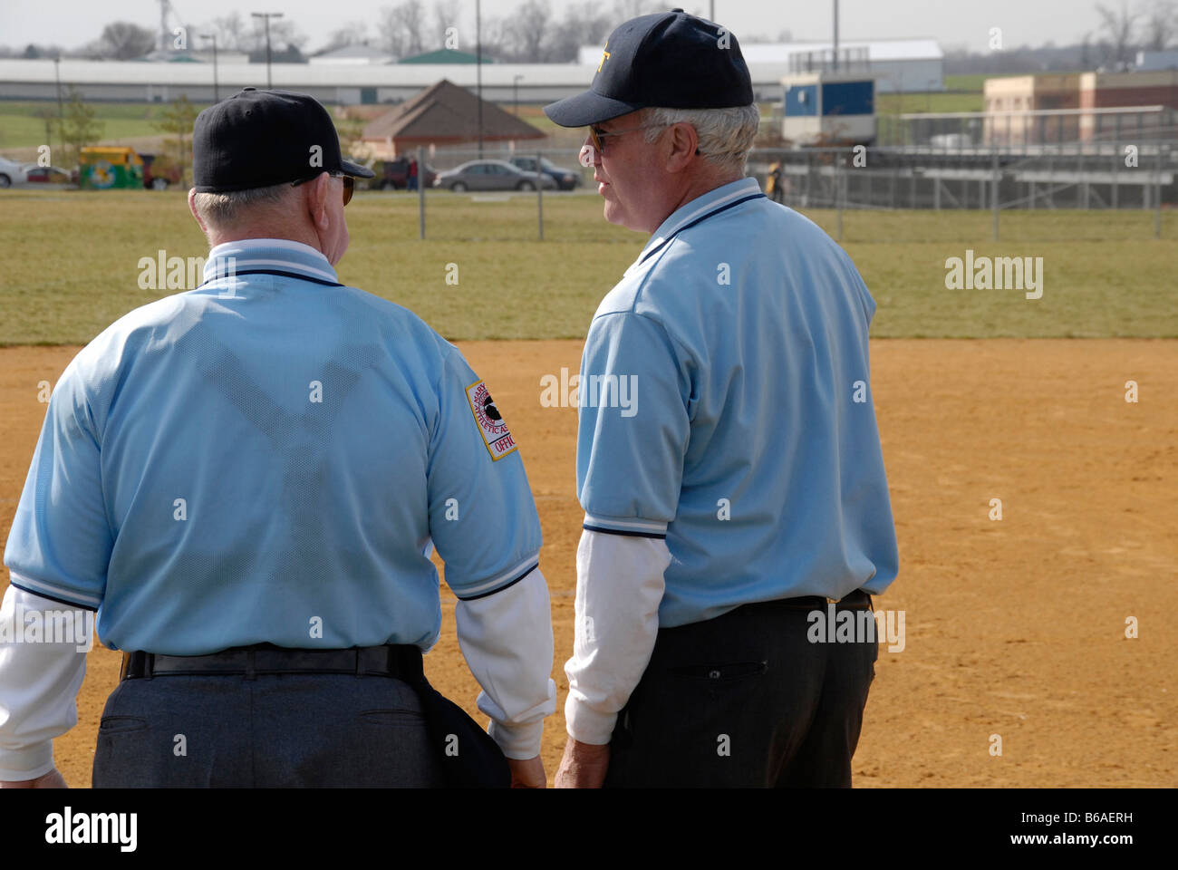 two baseball umpires talking Stock Photo