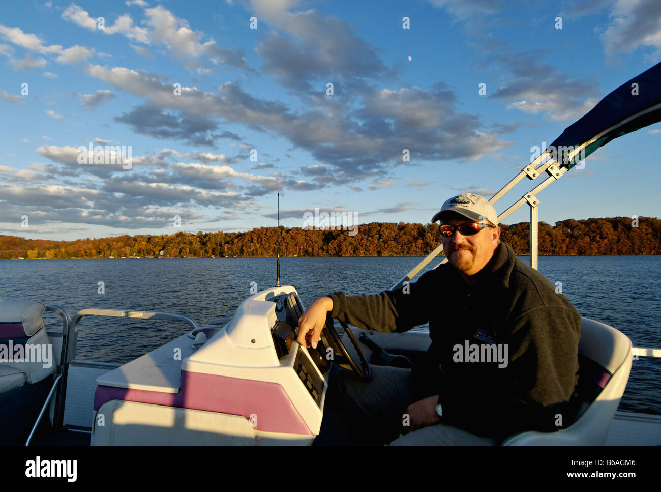 Man at the Helm of a Pontoon Boat on Watts Bar Lake in Rhea County