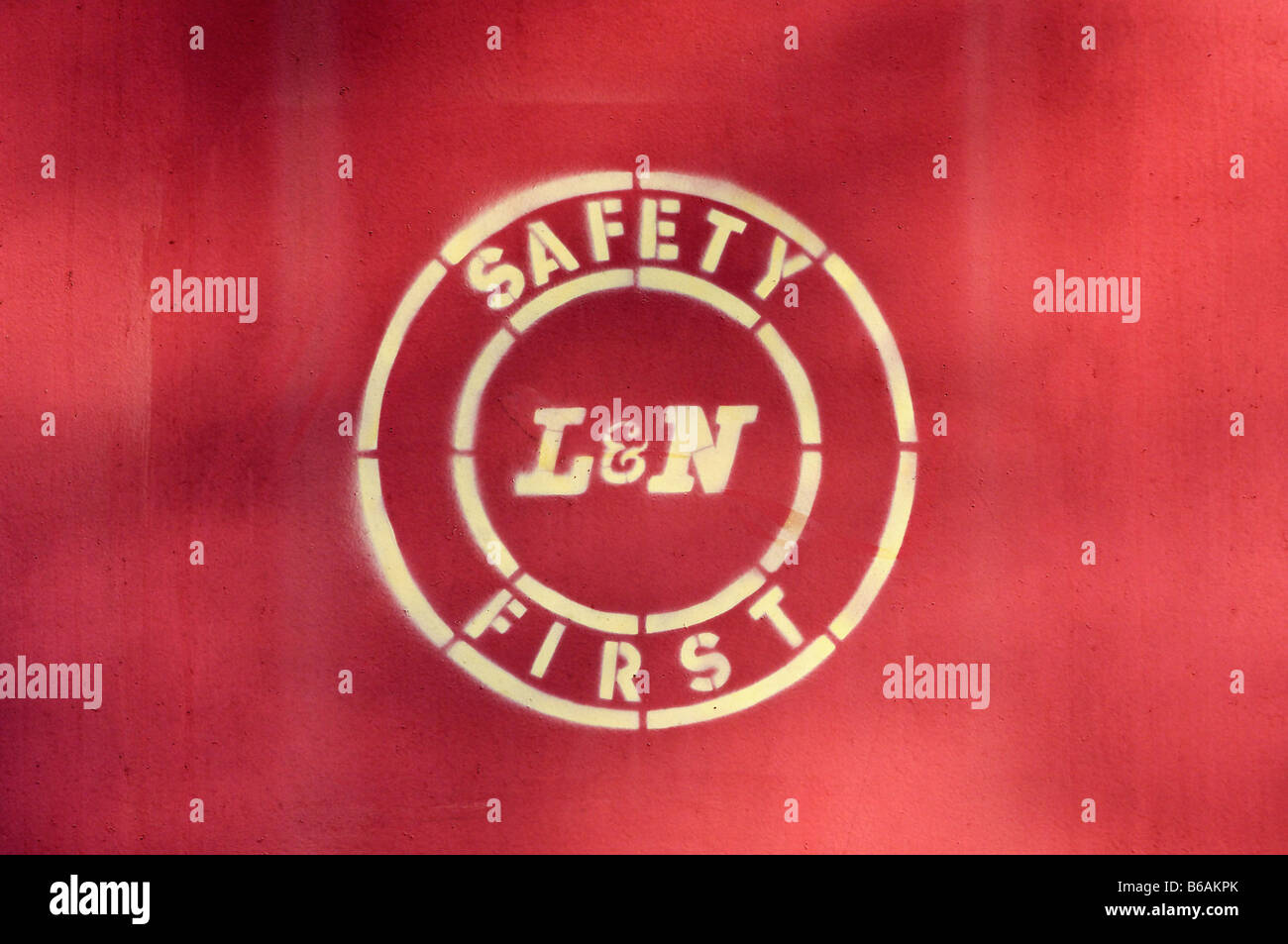 Safety First Sign Stenciled on the side of a Red Caboose at the Etowah L&N Depot and Museum in McMinn County Tennessee Stock Photo