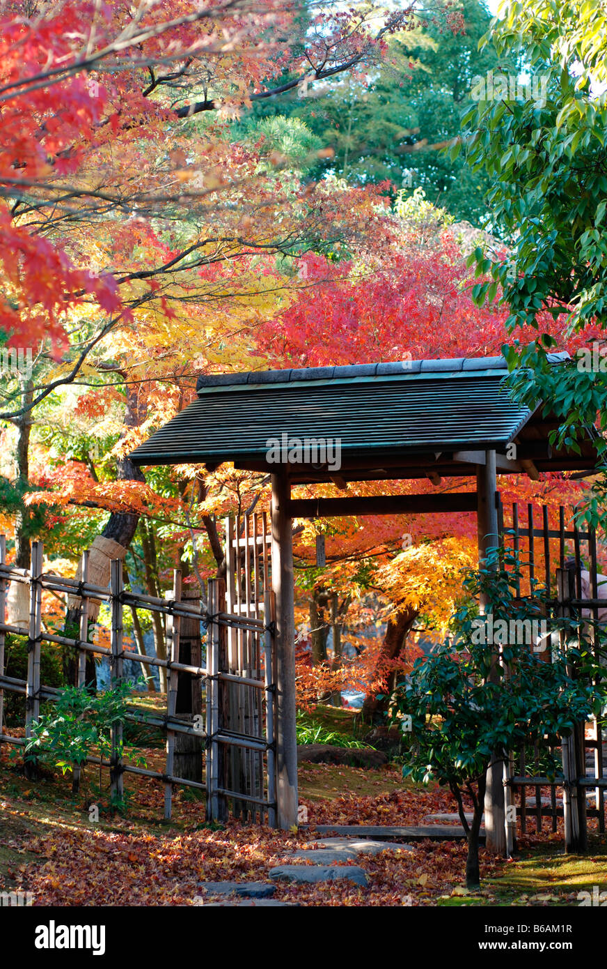 Traditional arch type gate in Japanese garden Stock Photo