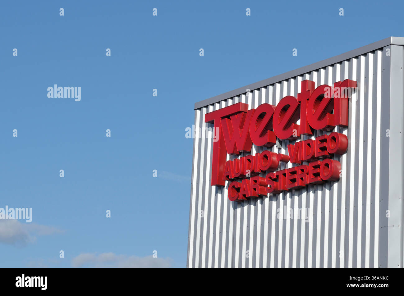 Tweeter store sign on exterior of retail store building USA Stock Photo
