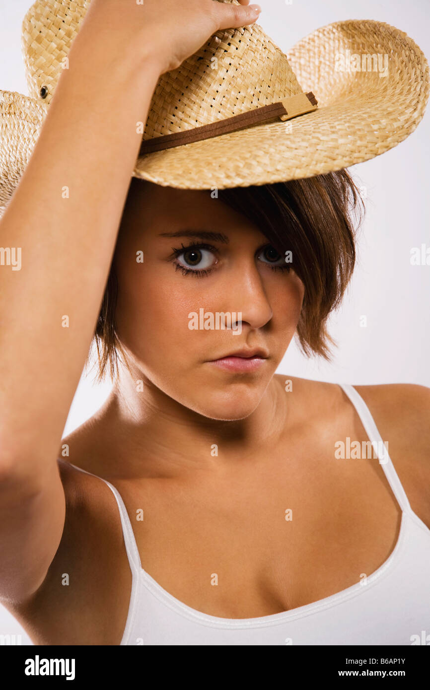 Woman wearing straw cowboy hat hi-res stock photography and images - Alamy