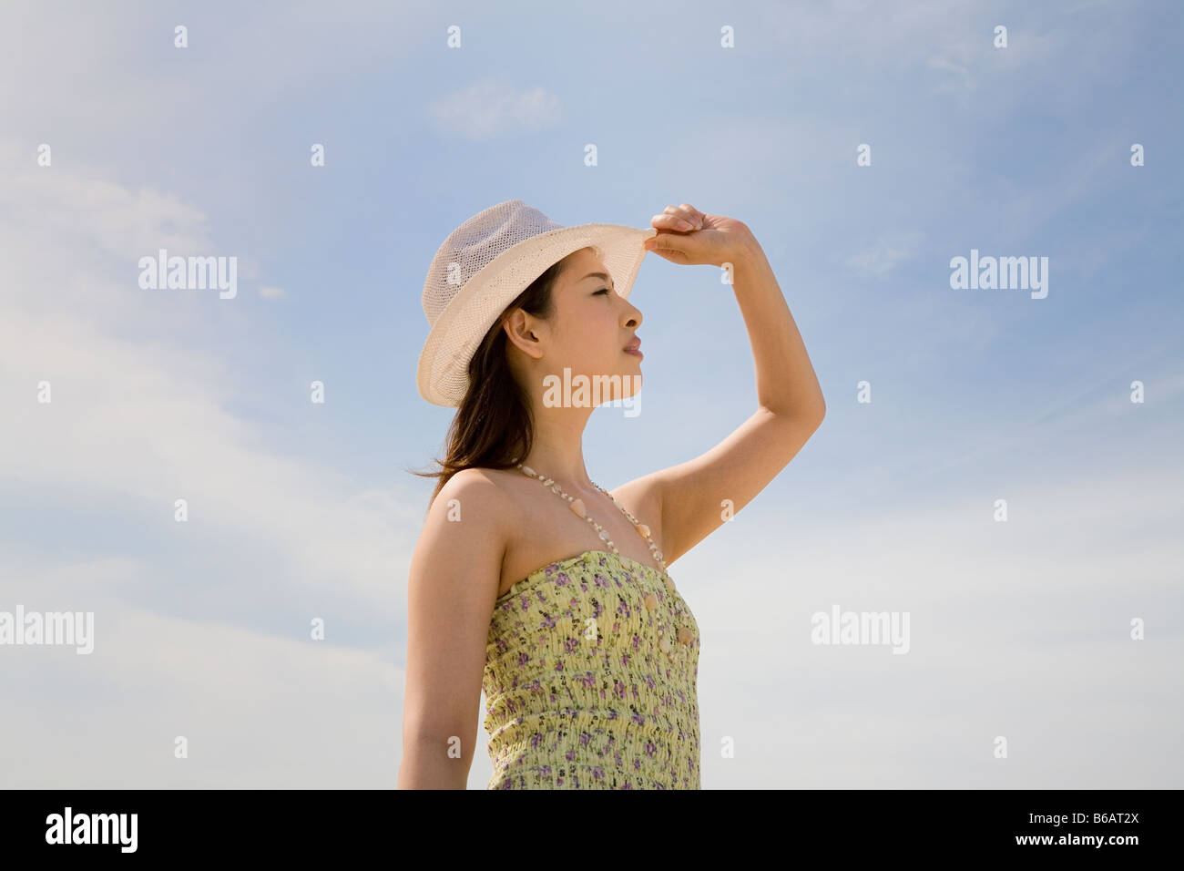 Asian young woman wearing hi-res stock photography and images - Alamy