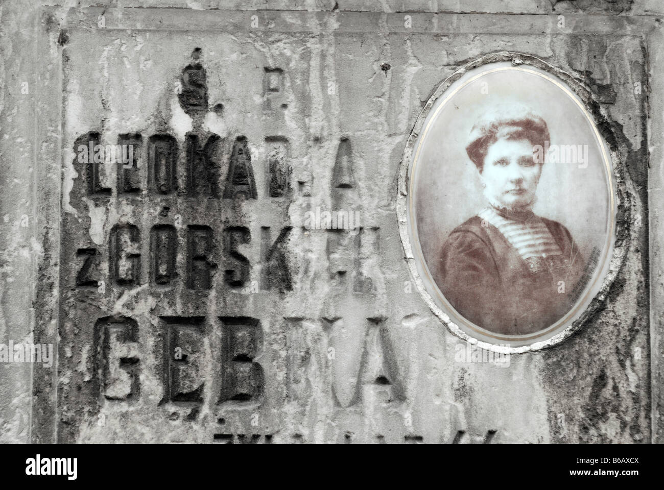 Porcelain portrait on gravestone Old Powazki cemetery in Warsaw