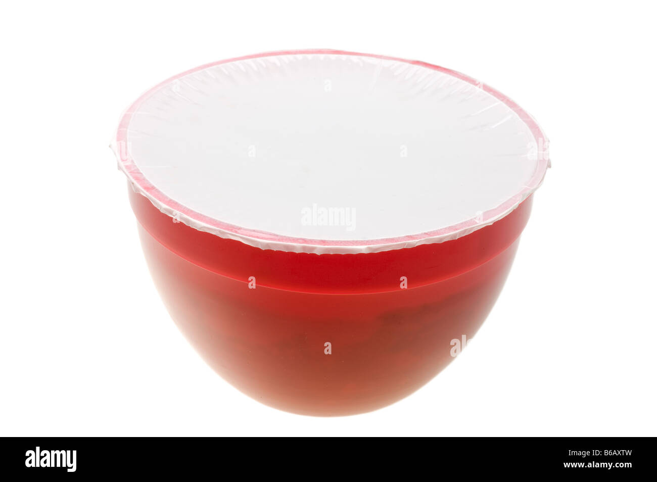 Christmas Pudding in a sealed plastic container ready for cooking Stock Photo