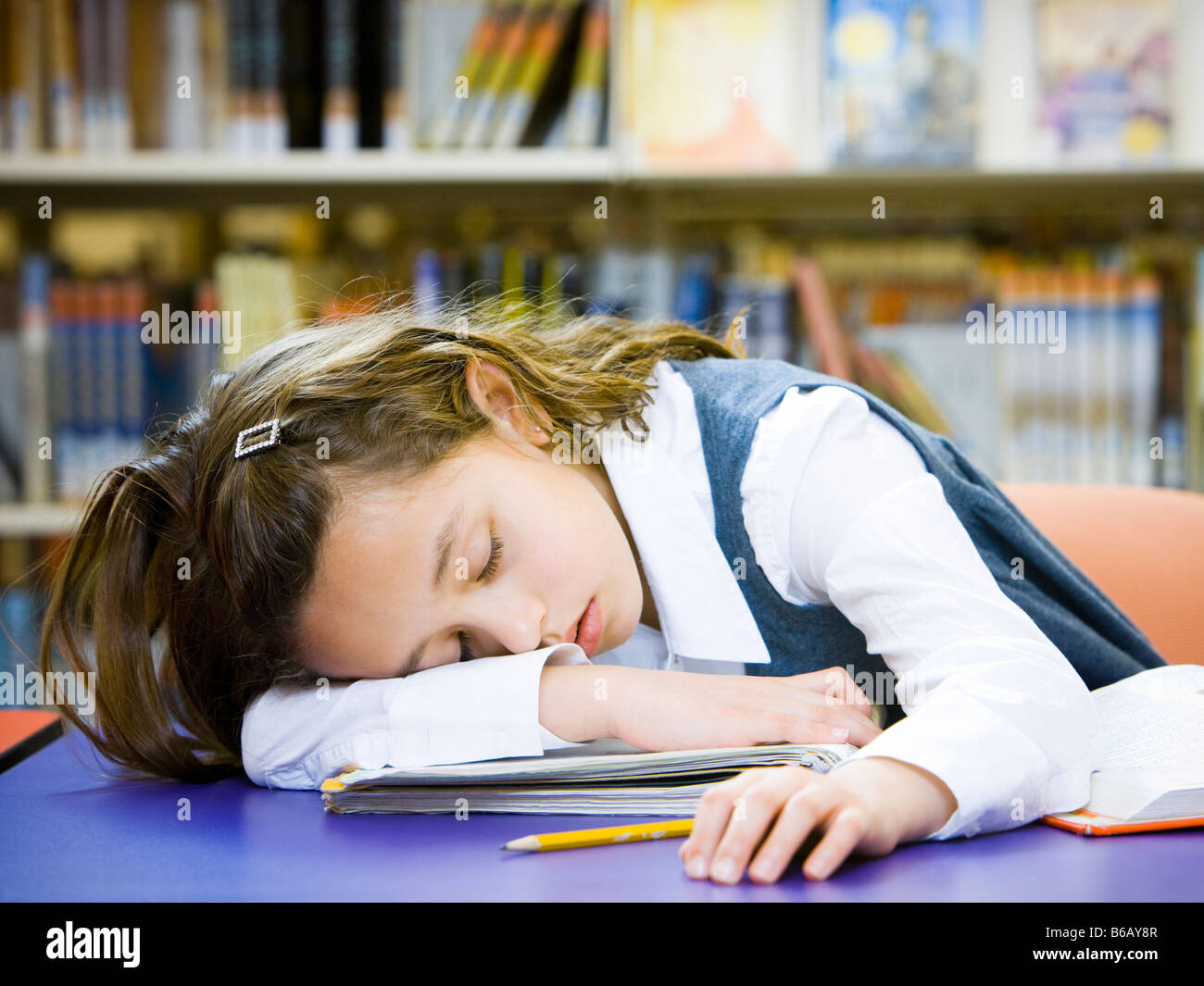 Campus Library Napping Girl sleeping library hi-res stock photography and images - Alamy