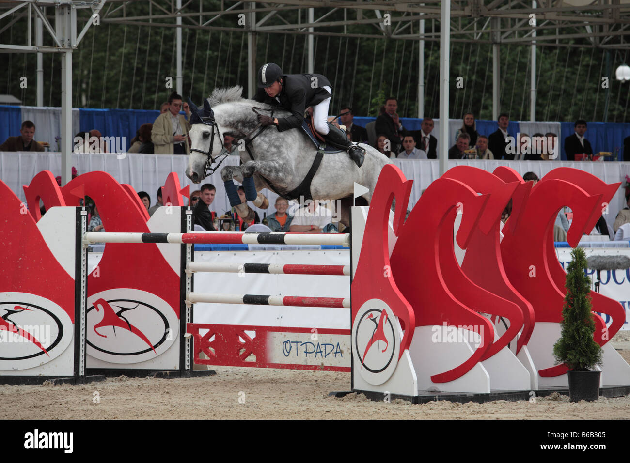 Equestrian sport. Show jumping competition. Concour hoppique Stock
