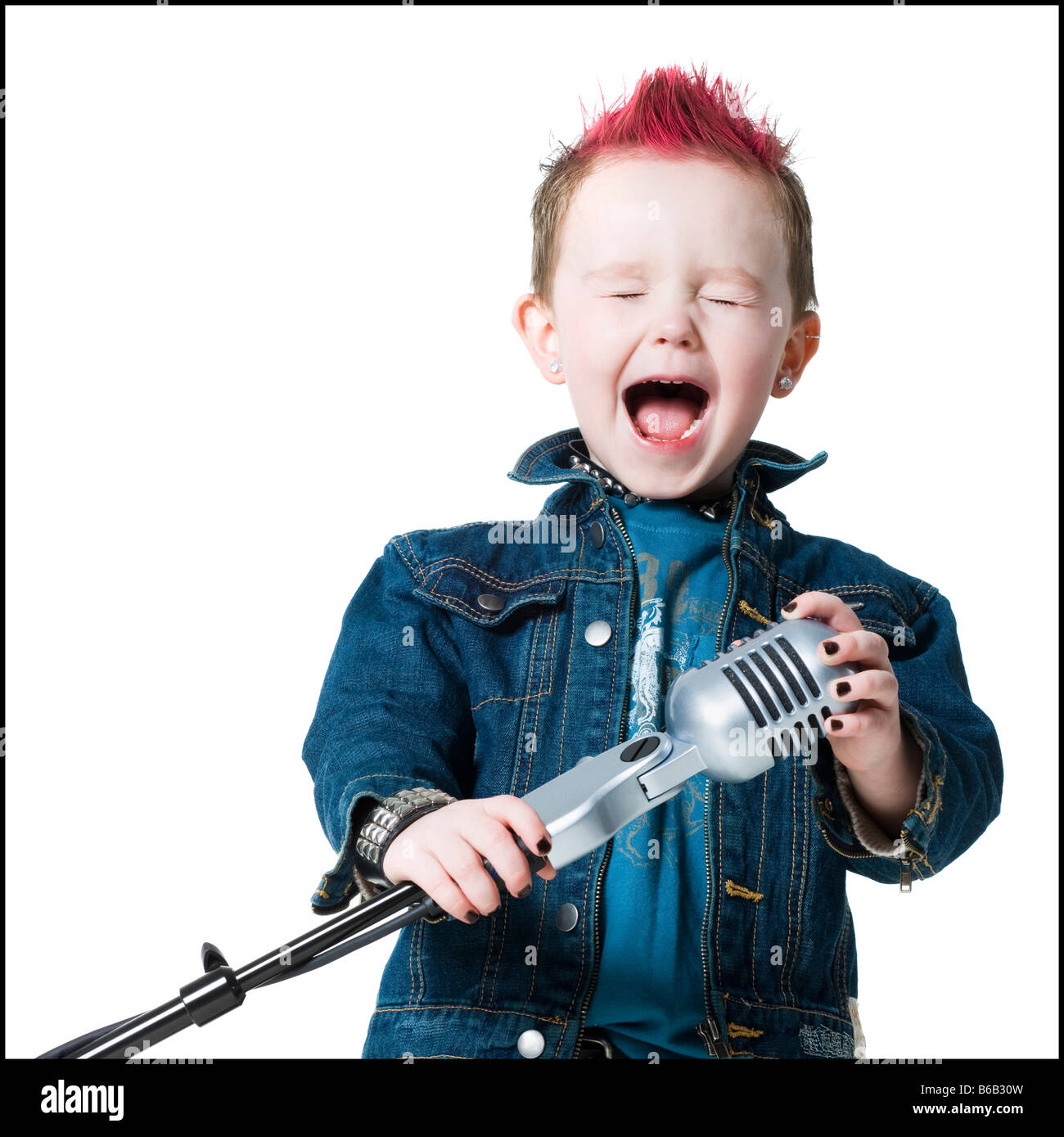 little boy singing into a microphone Stock Photo Alamy