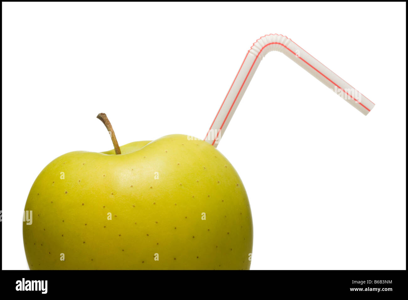 apple with a straw in it Stock Photo
