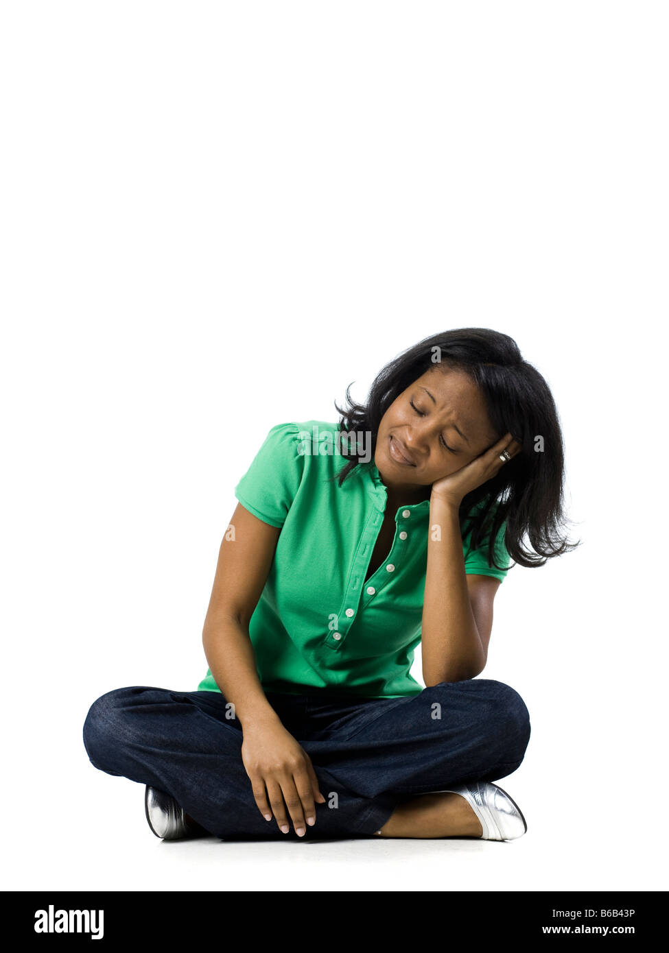 Tired african woman in green hi-res stock photography and images - Alamy