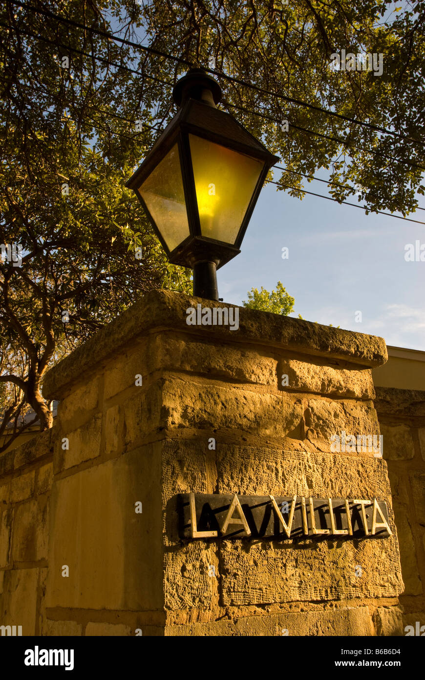 La Villita entrance sign street lamp stone wall historic arts village ...