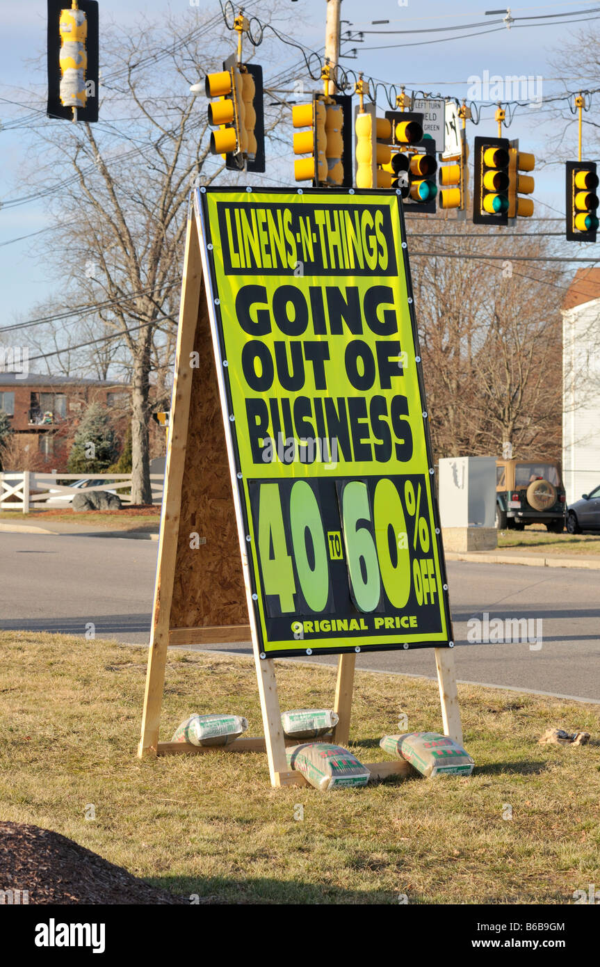 Sandwich board signs for retail store Linens and things going out of business sale. Stock Photo